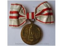 Austria WW1 Commemorative Medal without Swords for Non Combatants by Grienauer on Ladies Bow for Female Recipients