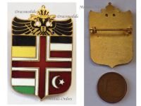 Austria Hungary WW1 Cap Badge Shield with the Central Powers Flags and the Imperial Double Headed Eagle