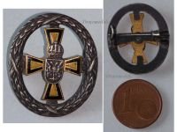 Austria Hungary WW1 Cap Badge Yellow Black Cross for War Aid with Laurel