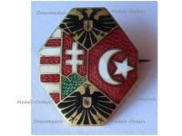 Austria Hungary WW1 Cap Badge with the Central Powers Flags and the Imperial Eagles Official Type by the War Support Office 